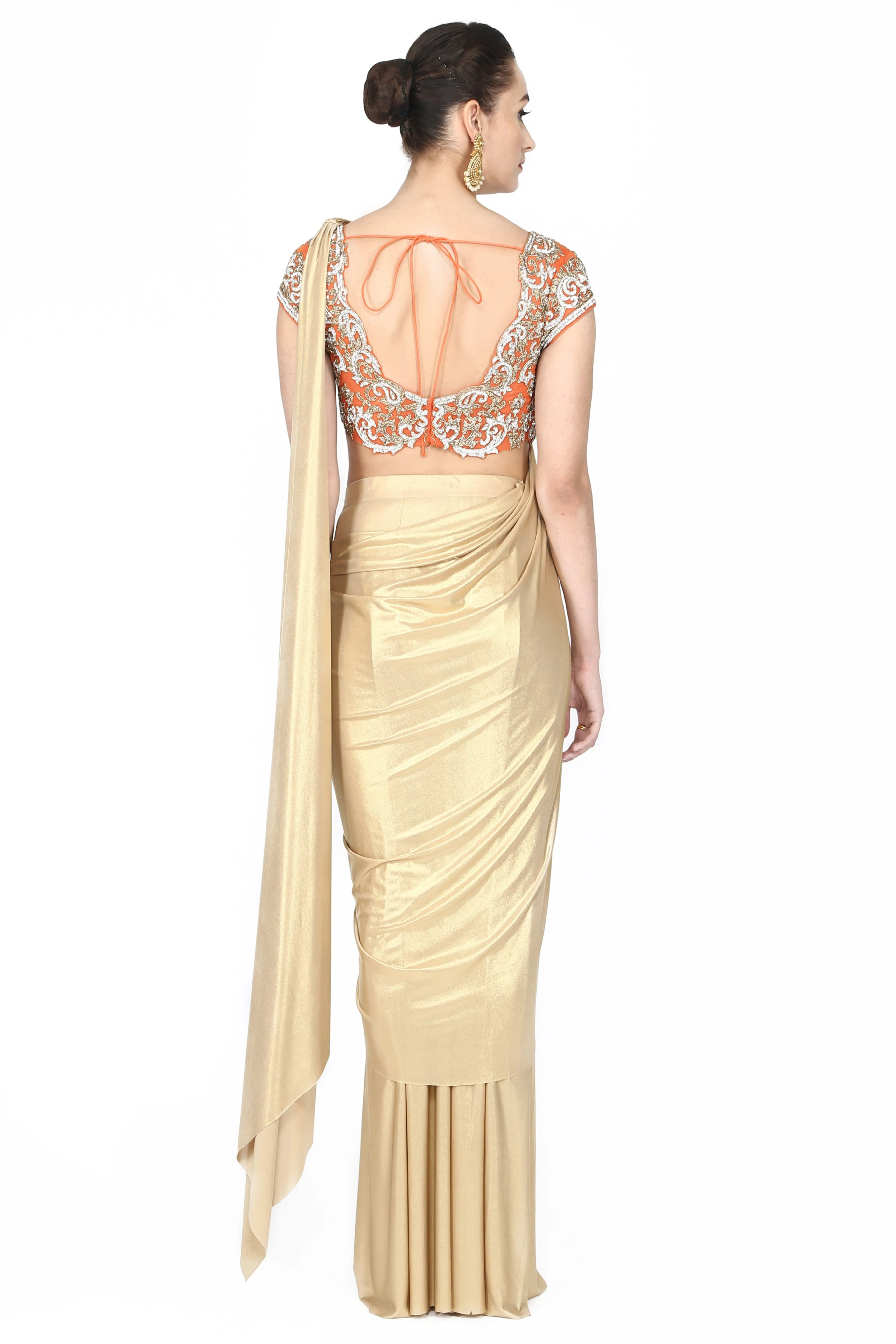 Metallic golden drape saree.