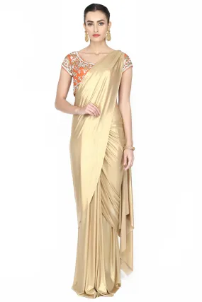 Metallic golden drape saree.