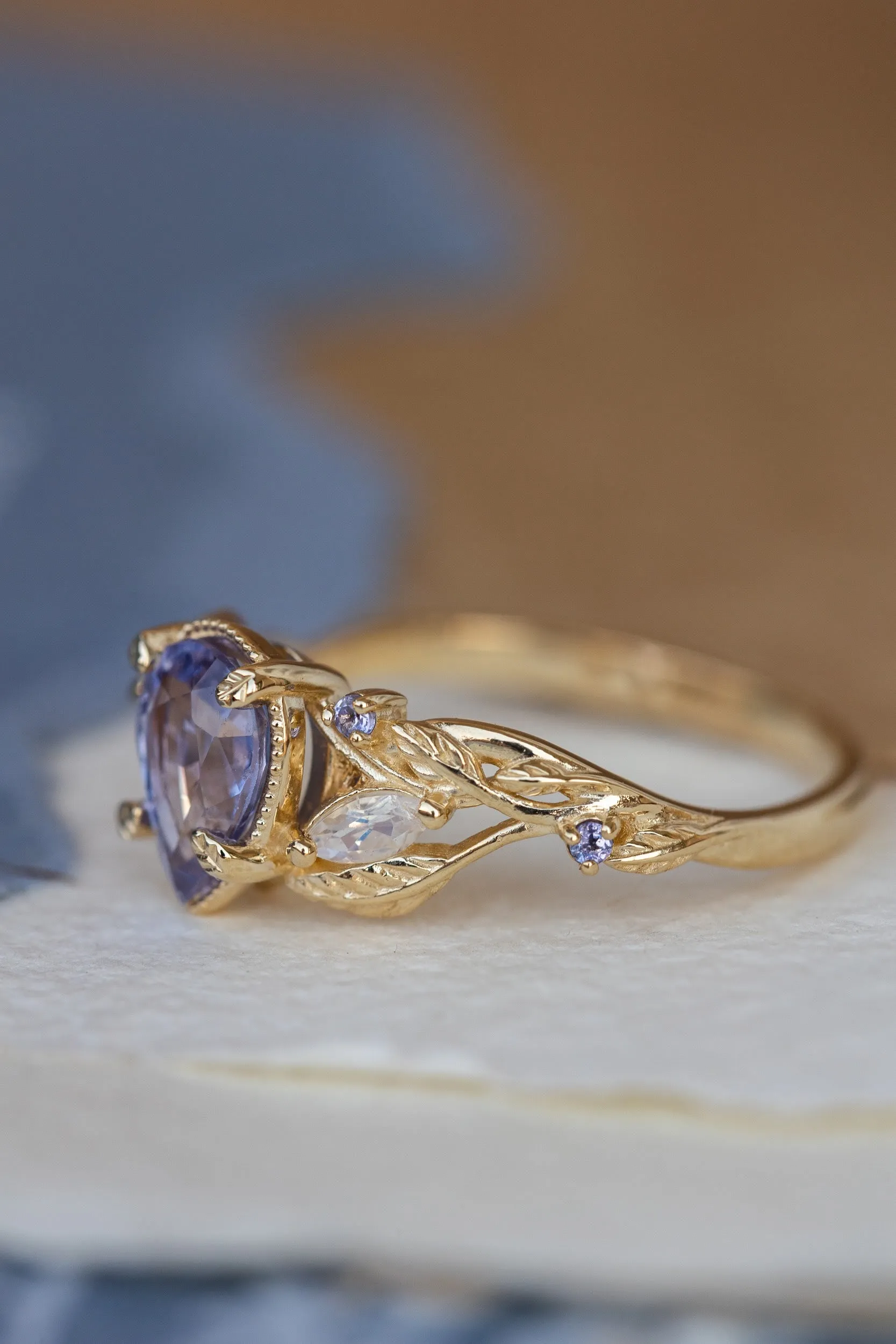 READY TO SHIP: Patricia ring in 14K yellow gold, natural purple sapphire 8x6mm, accent natural moonstones and tanzanites, AVAILABLE RING SIZES: 6-8US