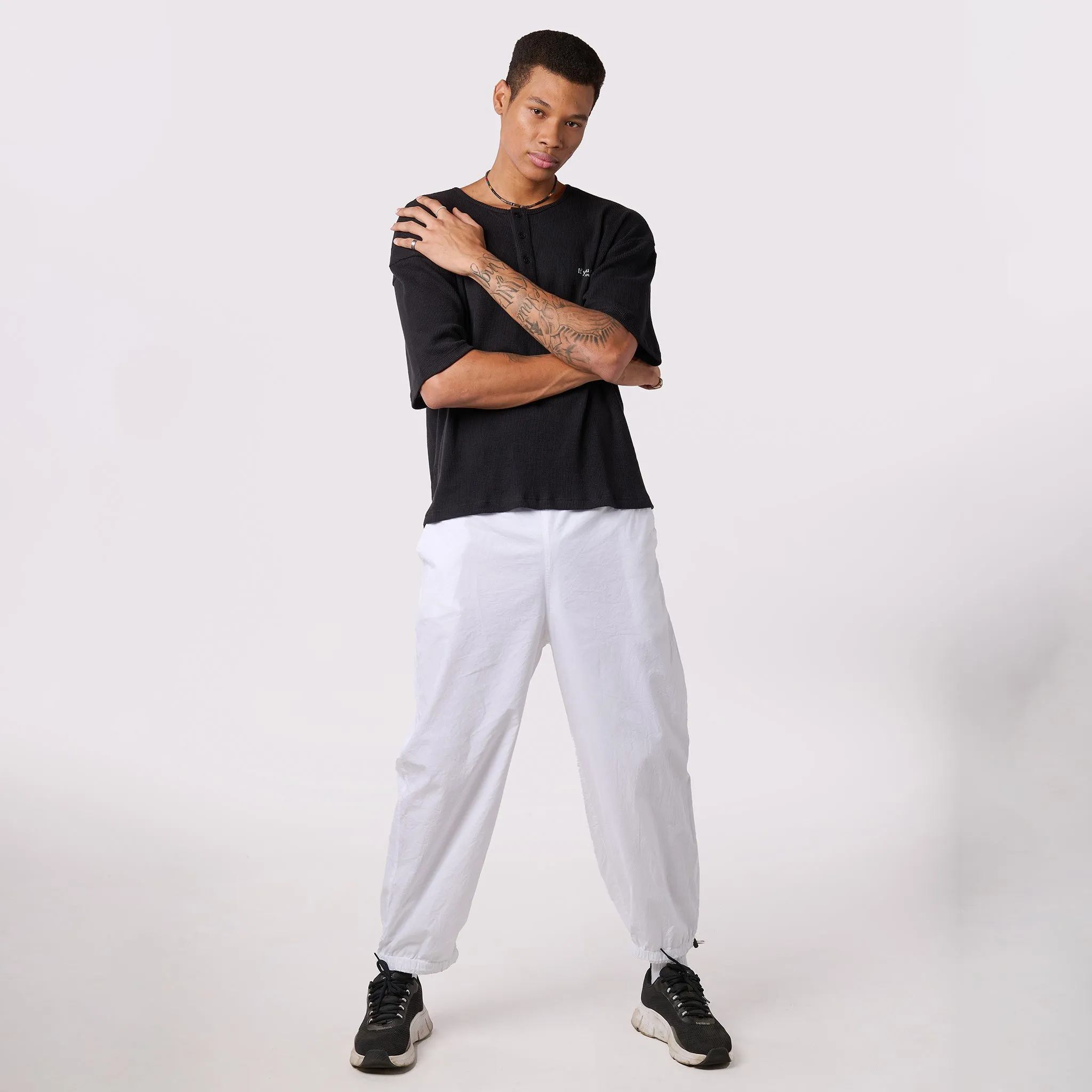 White Parachute pants & Black Textured knit top Set for Men