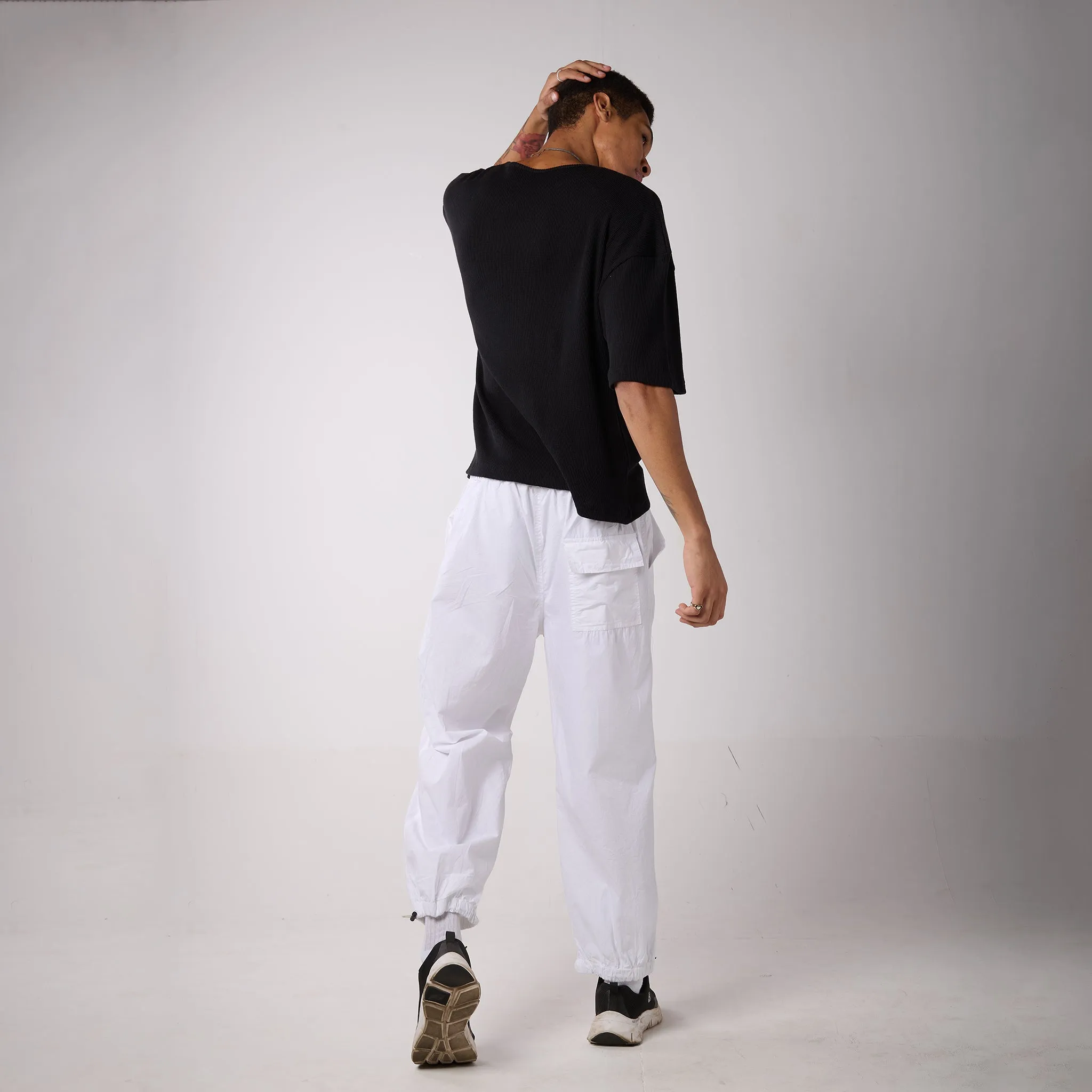 White Parachute pants & Black Textured knit top Set for Men